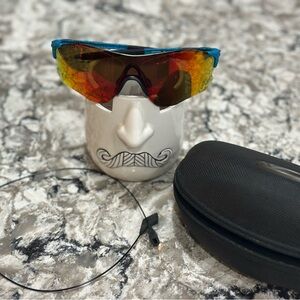 Oakley black and Blue Men's Sunglasses with reds lenses